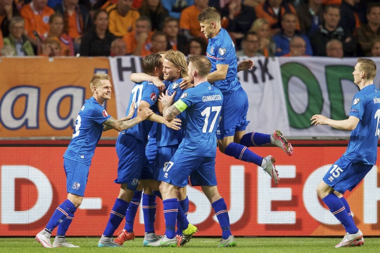 Mandatory Credit: Photo by Hoogte/REX Shutterstock (5036645a)
(L-R) Ari Freyr Skulason of Iceland, Gylfi Por Sigurdsson of Iceland, Birkir Bjarnason of Iceland, Aron Einar Gunnarsson of Iceland, Johann Berg Gudmundsson of Iceland, Jon Dadi Bodvarsson of Iceland celebrate
Netherlands v Iceland, UEFA Euro 2016 qualifier football match at Amsterdam Arena, The Netherlands - 03 Sep 2015